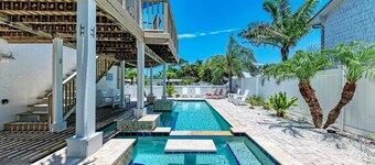 AMI Retreat: 200 Steps to Beach, Dog Friendly Pool Home by Anna Maria Life Vacation Rentals