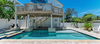 AMI Retreat: 200 Steps to Beach, Dog Friendly Pool Home by Anna Maria Life Vacation Rentals
