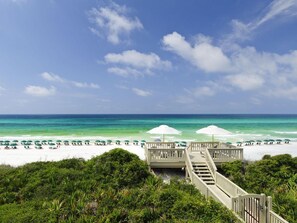 A beach with a wooden walkway leading to umbrellas. - ☀️ROSEMARY THYME- BEACH-4 minute walk☀️Grill, Bikes, Beach Chairs, Umbrella,Toys!☀️ (Rosemary Beach)
