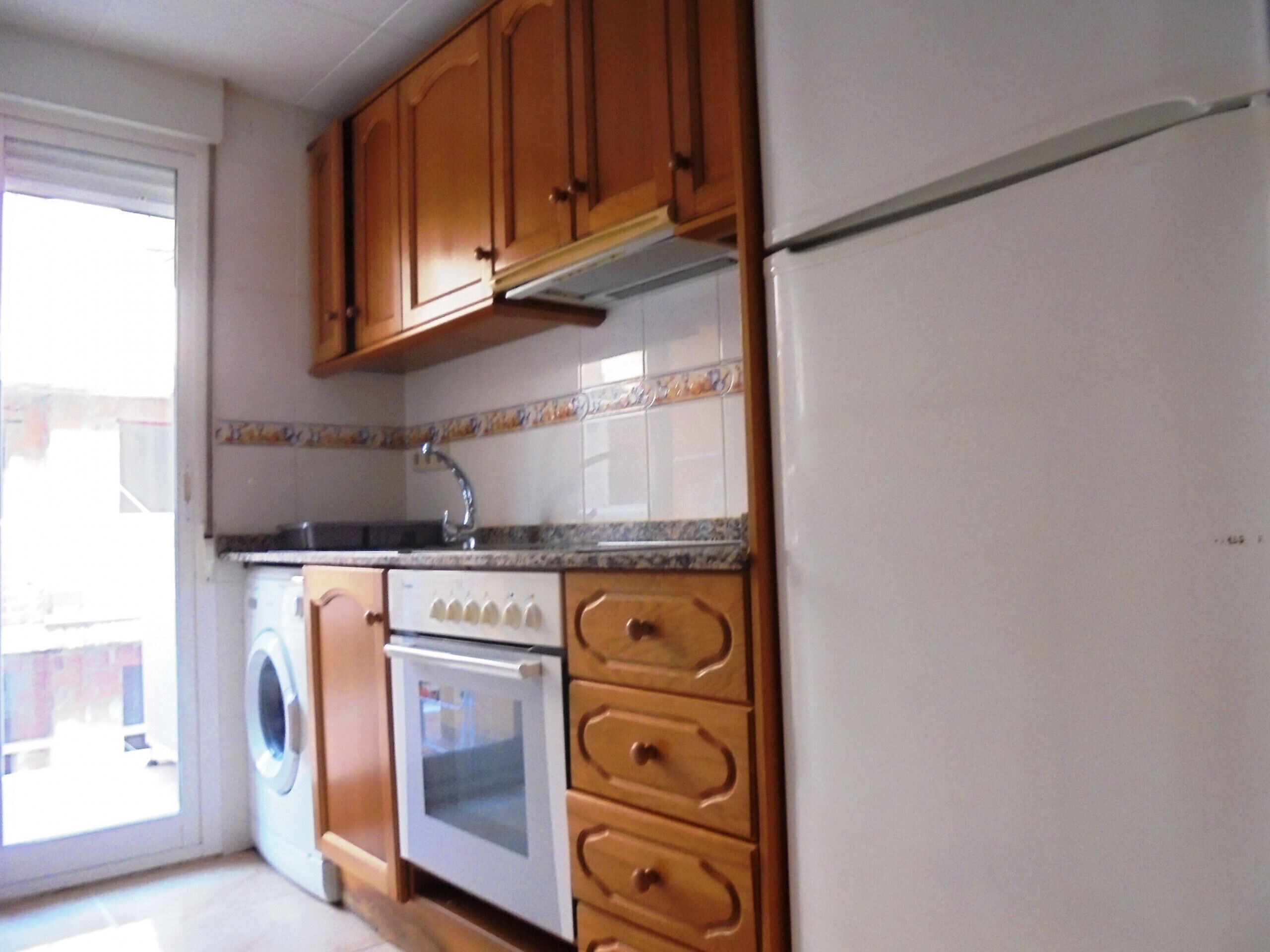 Fridge, oven, coffee/tea maker, cookware/dishes/utensils