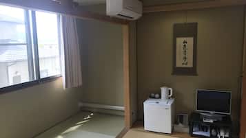 Flat-screen TV, pay movies