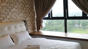 Apartment, 2 Bedrooms, City View, Garden Area | 1 bedroom, desk, soundproofing, iron/ironing board