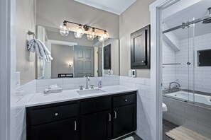 Bathtub, hair dryer, towels
