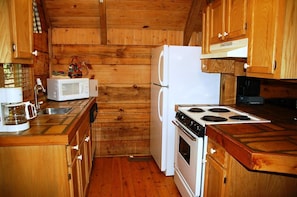 Microwave, dishwasher, coffee/tea maker, cookware/dishes/utensils