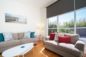 Premium Apartment, 2 Bedrooms | Living area | Flat-screen TV