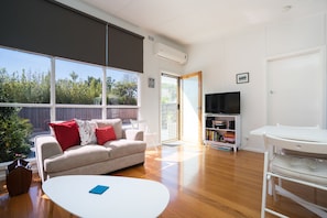 Premium Apartment, 2 Bedrooms | Living area | Flat-screen TV
