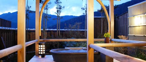 Suite with Private Open-air Bath “Sakura” | Bathroom | Hair dryer, slippers, bidet, towels