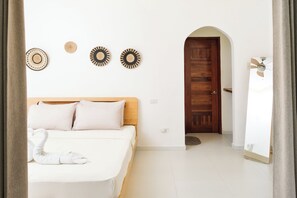 Deluxe Suite, Garden View | 1 bedroom, premium bedding, desk, blackout drapes