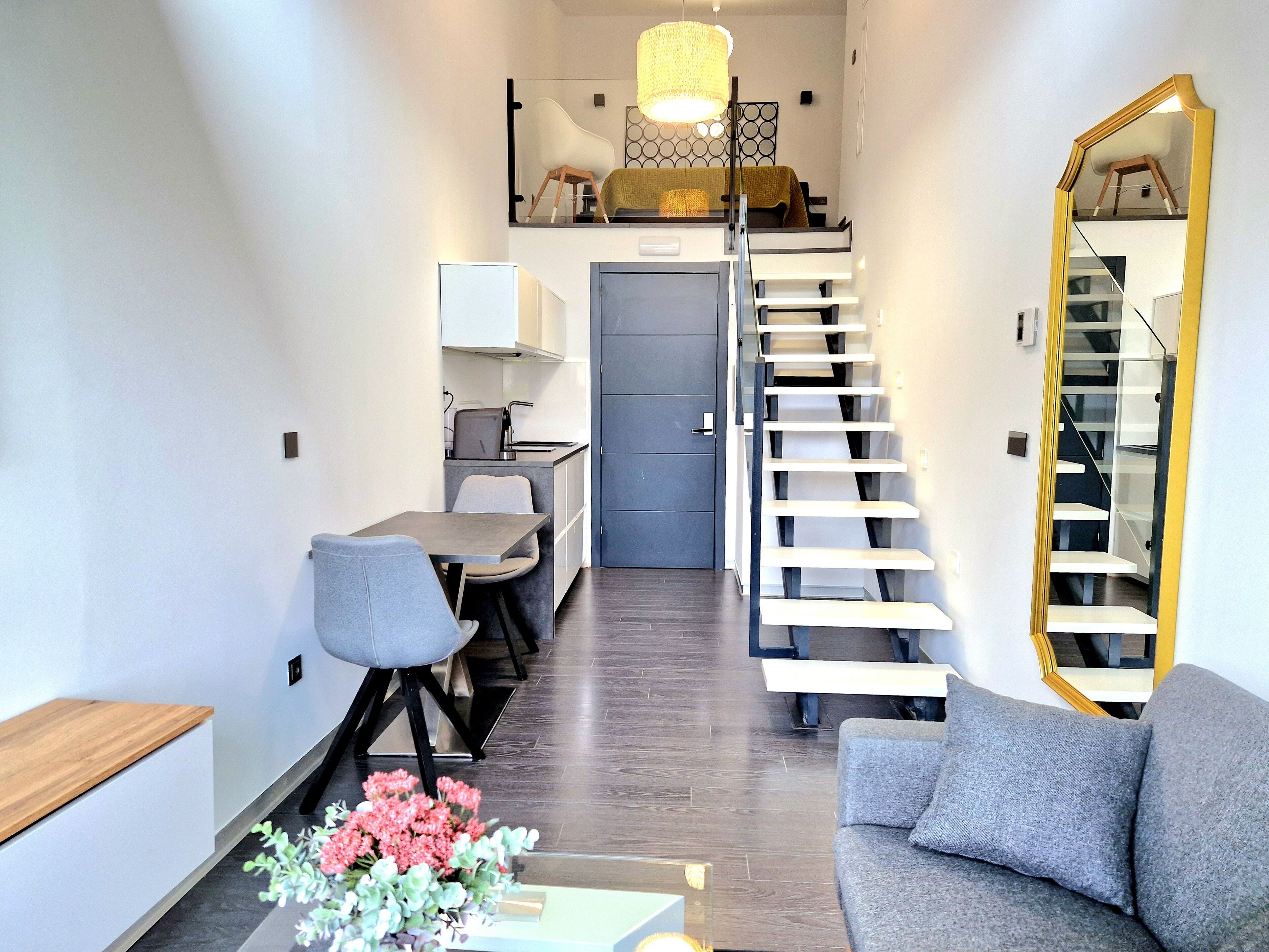 Deluxe Duplex, 1 Bedroom, Tower | Living area | Smart TV