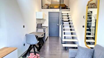 Deluxe Duplex, 1 Bedroom, Tower | Living area | Smart TV