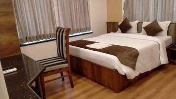 Deluxe Single Room | Individually furnished, blackout curtains, iron/ironing board, free WiFi
