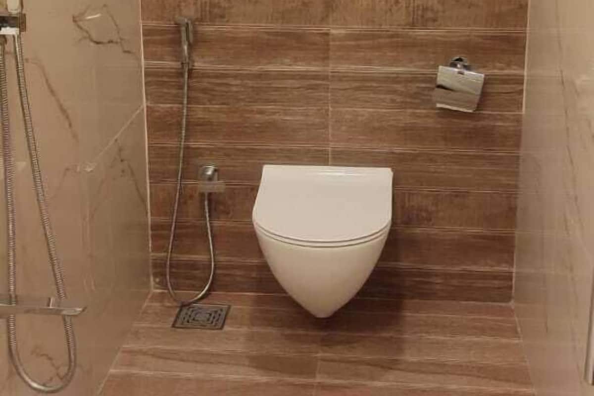 Deluxe eenpersoonskamer | Badkamer | Een douche, een regendouche, gratis toiletartikelen, handdoeken