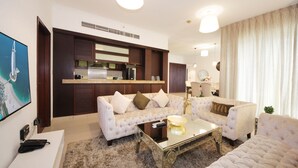 Luxury Apartment, 3 Bedrooms, City View | Living area | LED TV - New Arabian Holiday Homes - Residence 8 (Dubai)