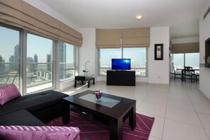 Apartment, 1 Bedroom (2204) | Living area | LED TV