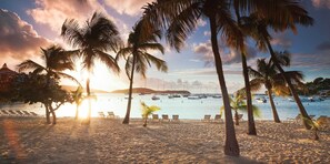 On the beach, sun loungers, beach towels