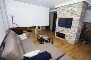 Deluxe Apartment, 2 Bedrooms | Living room | Flat-screen TV - City of the Kings Green Silence Apartment (Kraków)