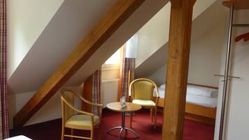 Triple Room, Private Bathroom | Blackout drapes, soundproofing, free cribs/infant beds, free WiFi