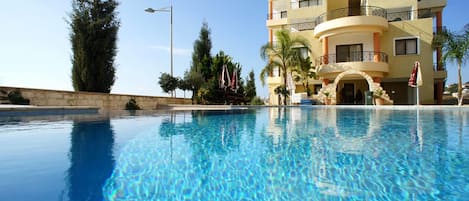 Outdoor pool, pool umbrellas, pool loungers