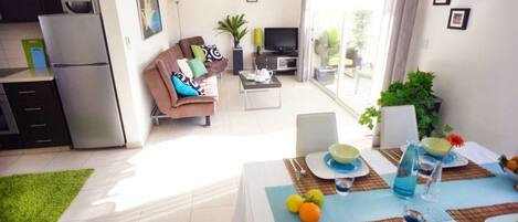 Apartment, 2 Bedrooms | Living area | Flat-screen TV