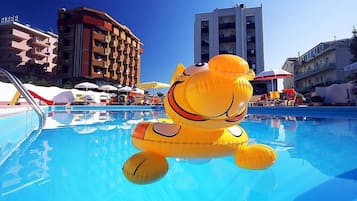Seasonal outdoor pool, pool umbrellas, pool loungers
