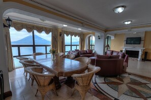 Family Apartment, 4 Bedrooms, Lake View, Lakeside | Living area | 20-inch LCD TV with cable channels, TV - Torres de Atitlan (Sololá)