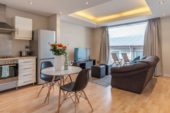 Standard Apartment, 1 Bedroom | Living room | Flat-screen TV
