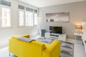 Design-Studiosuite, 1 Schlafzimmer, Stadtblick | Wohnbereich | Flachbildfernseher