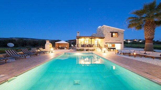 A two-story house with a swimming pool, outdoor seating, and a satellite dish. - Villa Isabella (Pegeia)