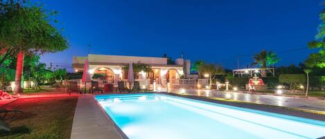 Seasonal outdoor pool, pool umbrellas, pool loungers