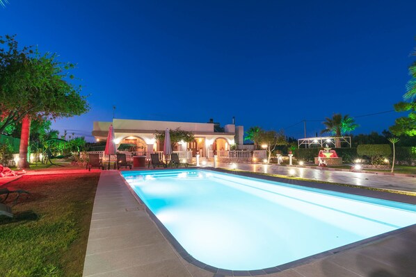 Seasonal outdoor pool, pool umbrellas, pool loungers