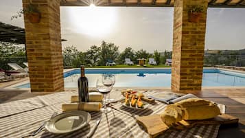 Seasonal outdoor pool, pool umbrellas, sun loungers