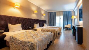 Standard Triple Room | Premium bedding, in-room safe, desk, laptop workspace
