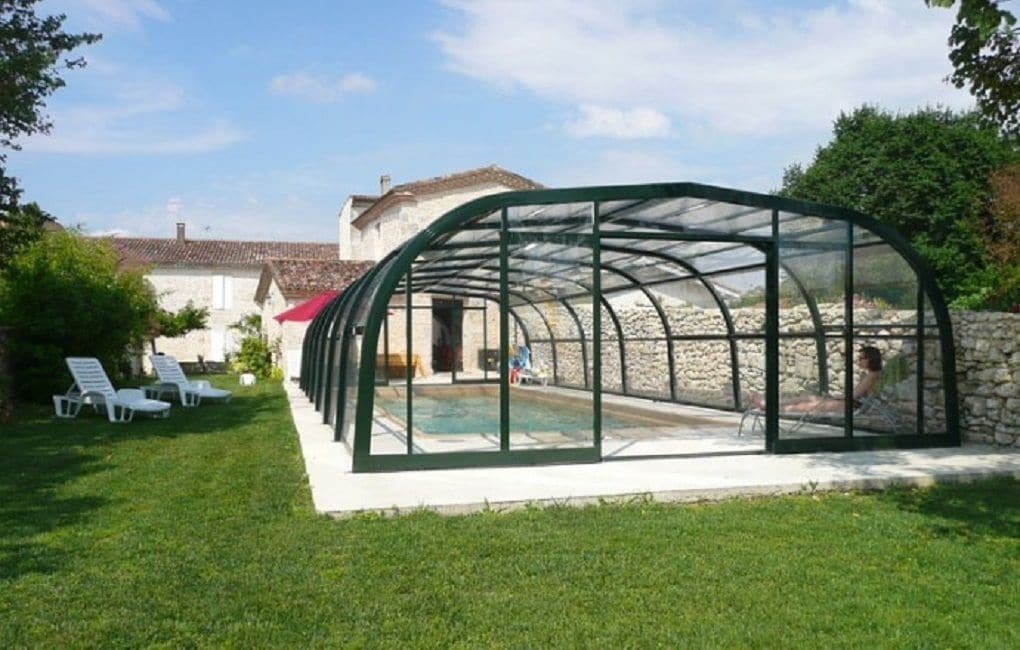 Indoor pool, seasonal outdoor pool, pool umbrellas, pool loungers
