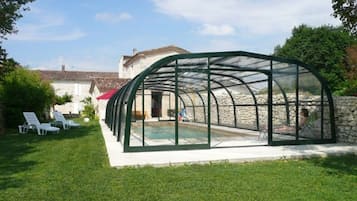 Indoor pool, seasonal outdoor pool, pool umbrellas, pool loungers