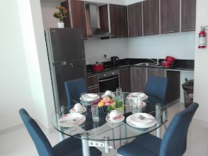 Fridge, microwave, oven - Ginger Luxury Apartments (Manama)