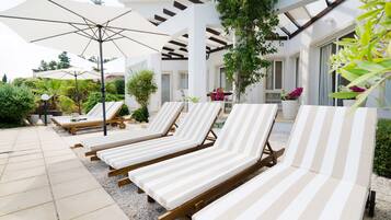 Outdoor pool, pool umbrellas, pool loungers