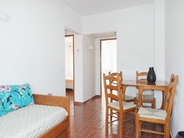 Apartment, 2 Bedrooms, Balcony | Living room | Flat-screen TV