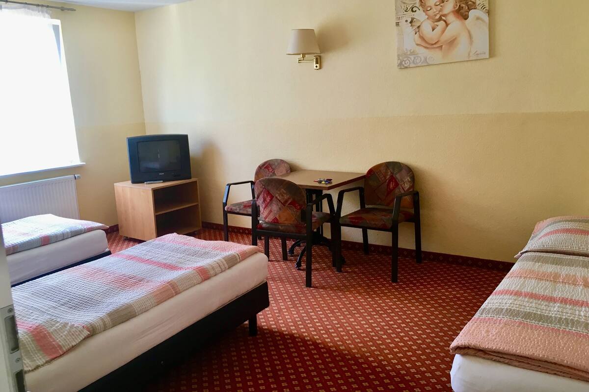 Economy Triple Room, Shared Bathroom | In-room dining