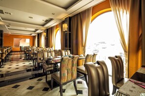 Breakfast, lunch, dinner served; local and international cuisine 