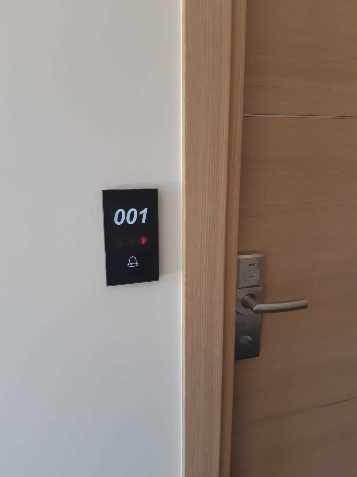 A door with a digital lock and a keypad displaying the number 001.