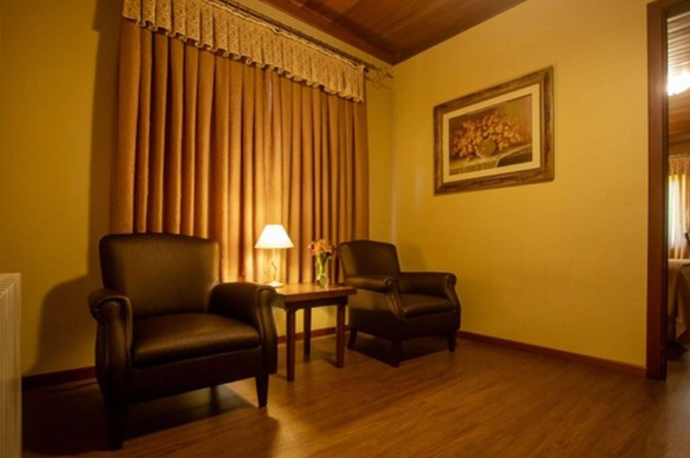 family suite | 1 bedroom, minibar, in-room safe, desk