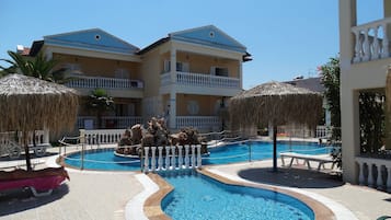 Outdoor pool, pool umbrellas, sun loungers