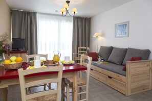 1-inch flat-screen TV with digital channels