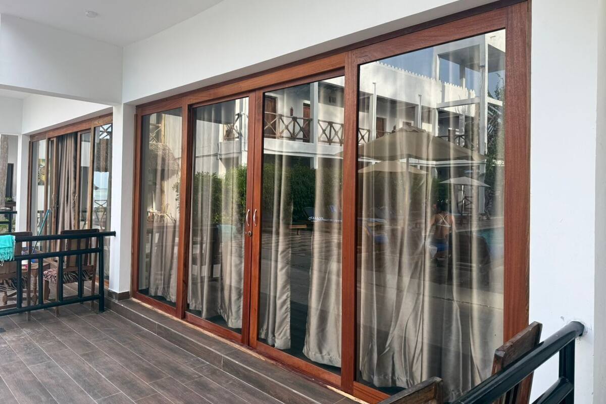 Deluxe Triple Room, Pool View | Premium bedding, individually furnished, desk, laptop workspace