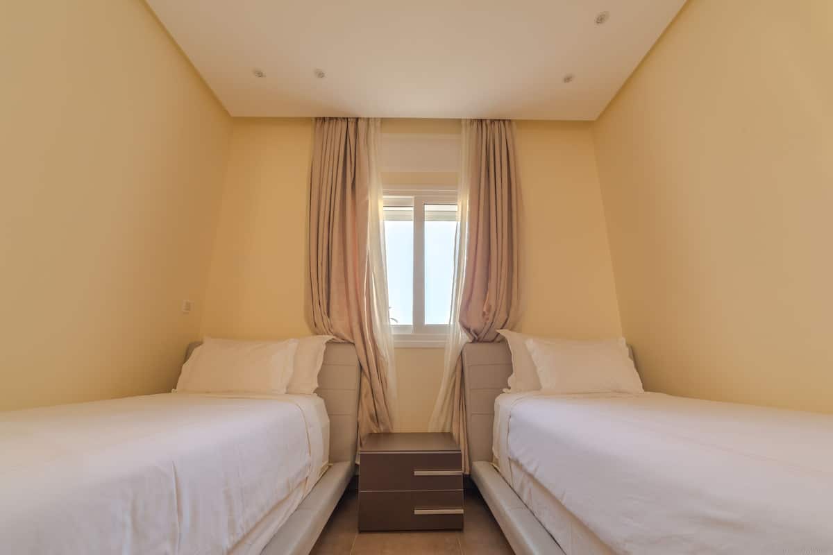 Blackout curtains, soundproofing, free WiFi, bed sheets