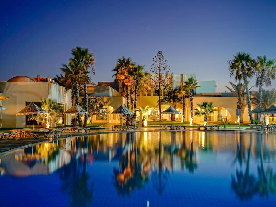 Indoor pool, outdoor pool, pool umbrellas, sun loungers