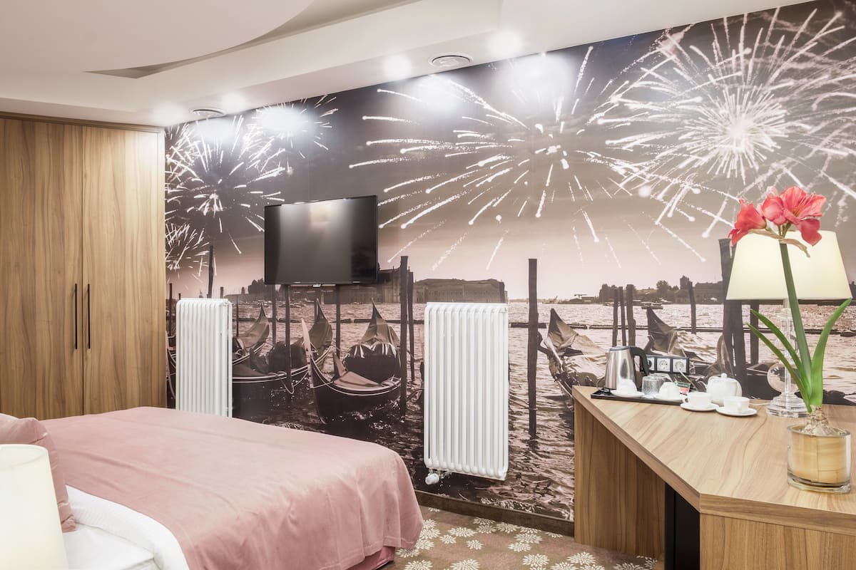 Premium bedding, in-room safe, desk, soundproofing