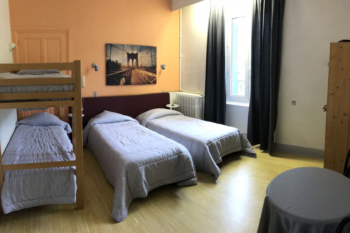 comfort quadruple room, multiple beds | individually decorated, individually furnished, desk, blackout curtains