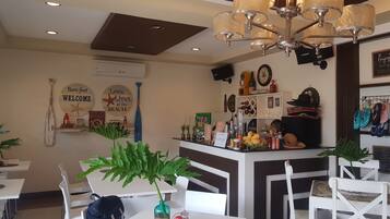 Breakfast, lunch, dinner served; local cuisine