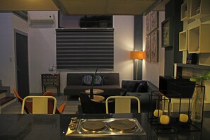 Loft 2 | Living area | 36-inch flat-screen TV with cable channels, TV - Bayview Country Inn El Nido (El Nido)